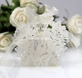 White laser-cut butterfly wedding favor box with a delicate white ribbon bow detail - Ivory White