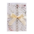 Laser-cut wedding invitation in pearl white with elegant champagne satin ribbon bow - White