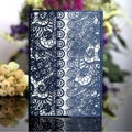 Navy blue laser-cut wedding invitation card with elegant floral lace pattern and white insert - Ink Blue