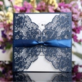 Navy blue laser cut lace wedding invitation card with ribbon bow and floral background - Ink Blue
