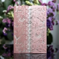 Pink laser-cut wedding invitation with intricate floral hollow design and white insert card - Pink