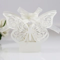 Elegant white laser-cut butterfly wedding favor box with a delicate white silk ribbon bow - Ivory White