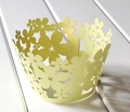 Laser-cut light yellow cupcake wrapper with floral patterns and star-shaped cutouts - Emerald Green