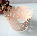 Pink laser-cut paper cupcake wrapper with floral patterns for dessert decoration - Champagne