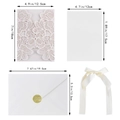 Elegant laser cut cream white floral wedding invitation set with envelopes and silk ribbons - White + Western Envelope