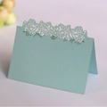 Light blue laser cut place card with delicate rose pattern for wedding table seating - Pearl Pale Blue