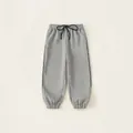 Pantaloni sportivi grigi da bambino con coulisse in vita e polsini alle caviglie - Grigio Melange / 120