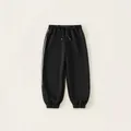 Pantaloni sportivi neri da bambino con strisce laterali e vita con coulisse - Nero / 120