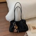 Detail of black suede tote bag with heart mirror pendant and leopard print charm - Suede Black With Cartoon Charm