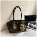 Dark brown faux leather tote bag with gold metal clasp and a plush bear charm pendant - With Charm / Brown