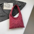 Rose red suede shoulder bag with silver rivet studs and a stylish minimalist design - Red