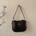Classic black vintage underarm bag with matte leather texture and golden metal buckle - Black Without Bear Charm