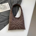 Vintage brown suede underarm bag featuring silver rivets in a stylish starburst pattern - Brown