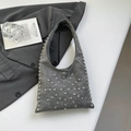 Gray faux suede underarm bag featuring silver rivet studs and a stylish minimalist design - Gray