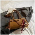 Chic tan faux suede handbag with star charm and teddy bear accessory on white linen - Brown with Pendant