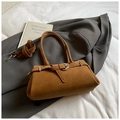 Vintage tan baguette handbag in faux suede with shoulder strap on wool coat background - Brown No Pendant