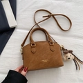 Vintage caramel brown shoulder bag with a matte texture and cute dog charm detail - Brown with Pendant