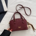 Retro burgundy suede handbag for women featuring a plush bear charm and crossbody strap - Wine Red With Charm Style