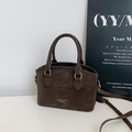 Vintage dark brown crossbody handbag for women with gold logo and textured matte finish - Coffee Minimalist Style
