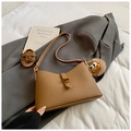 Dark brown lychee leather crossbody square bag with gold lock and plush monster charm - With Charm / Brown