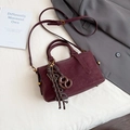 Elegant burgundy Boston handbag with pretzel charm and adjustable strap for women - With Charm / Red