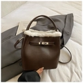 Brown litchi leather bucket bag with white faux fur trim and silver turn-lock hardware - Brown