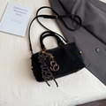 Elegant black Boston handbag in suede-like finish with stylish pendants and long strap - With Charm / Black