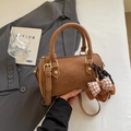 Brown Boston cylinder handbag in matte finish with a cute teddy bear plush charm - With Charm / Brown