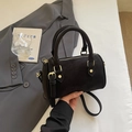 Chic black Boston handbag in suede texture with gold hardware and adjustable strap - No Pendant / Ebony