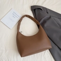 Brown litchi grain crescent shoulder bag with silver zipper in a minimalist style - Brown No Pendant