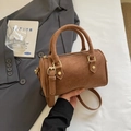 Vintage brown Boston barrel bag with matte leather finish and golden hardware details - No Pendant / Brown
