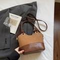 Brown dual-tone patchwork crossbody bag with elegant top handle and gold hardware - Brown No Pendant
