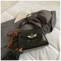 Elegant black leather trapezoid handbag with silver buckle and leopard print bear charm - With Charm / Black