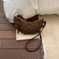 Brown woven crescent bag with black dots and embroidered bows and knotted leather strap - Brown