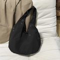 Minimalist black nylon hobo bag for women with decorative metal eyelets and large capacity - Black