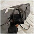 Mini black suede handbag with white contrast stitching and metallic buckle detail - Black