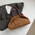 Brown large capacity suede tote bag for women shown with grey blazer and white book - Khaki Small
