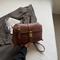 Vintage dark brown leather handbag with gold buckle and white stitching details - Brown