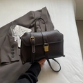 Retro dark brown crossbody bag with white contrast stitching and gold metal buckle - Coffee