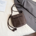 Dark brown retro bucket bag with decorative contrast stitching and soft matte leather - Brown