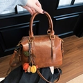 Vintage brown leather Boston bag with colorful leaf charm and adjustable shoulder strap - With Charm / Brown