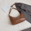 Brown vintage faux leather hobo bag with silver buckle and adjustable shoulder strap - Brown
