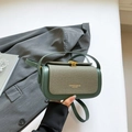 Deep green leather crossbody box bag with woven texture flap and golden buckle - Green