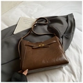 Bolso tote vintage marrón oscuro en cuero brillante con elegante hebilla metálica - Marrón