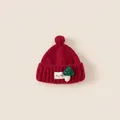Deep red knitted beanie for kids with decorative pom-pom and cute mushroom patch - Head circumference 48-52cm / Solid Red