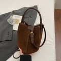Deep brown suede bucket bag with contrast stitching and shoulder strap in retro style - Coffee No Charm