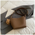 Brown litchi leather bucket bag with contrast stitching and plush dog charm - With Pendant / Brown