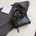 Fashionable black matte leather tote bag with elegant tassels and adjustable shoulder strap - Black / Small
