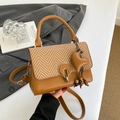 Caramel brown leather and woven crossbody bag with silver hardware and heart charm - Brown
