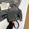 Chic black crossbody bag with vintage metal ring and mixed textures for women - Black